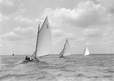 The 6 Metre 'Correnzia', 'The Whim' and 'Snowdrop' on a run, 1911. Creator: Kirk & Sons of Cowes.