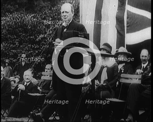 Winston Churchill Making a Speech from a Platform Infront of a Small Crowd, 1924. Creator: British Pathe Ltd.