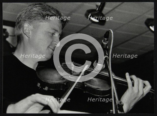 Christian Garrick playing the violin at The Fairway, Welwyn Garden City, Hertfordshire, 2000. Artist: Denis Williams