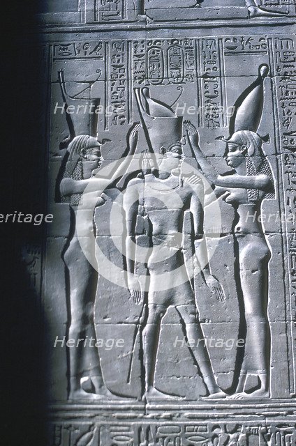 Relief of the Pharaoh between two goddesses, Temple of Horus, Edfu, Egypt, c251BC-c246BC. Artist: Unknown