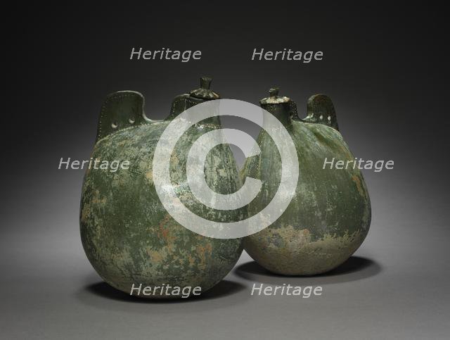 Pair of Leather Bag-Shaped Flasks with Covers, 916-1125. Creator: Unknown.