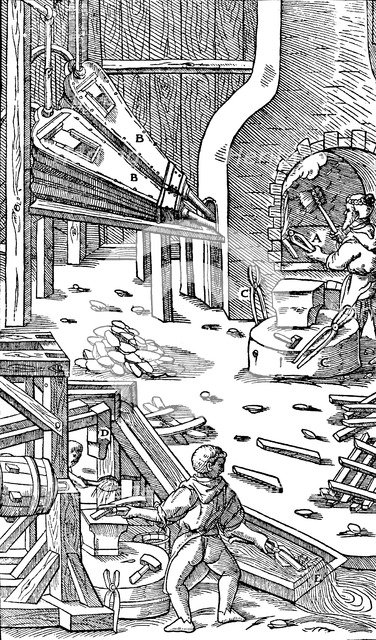 Steel production: a forge with bellows to produce draught, 1556. Artist: Unknown