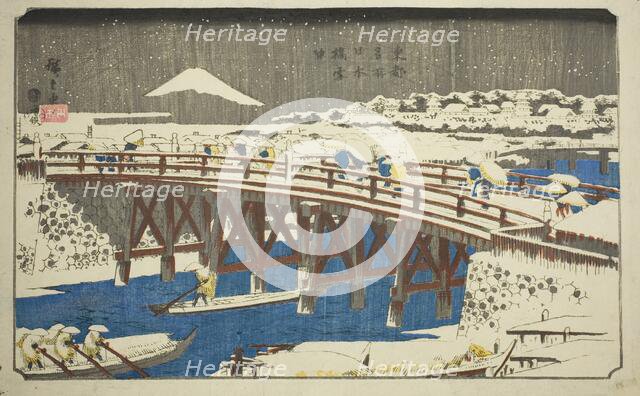 Nihon Bridge in Snow (Nihonbashi setchu), from the series "Famous Places in the Eastern...c.1842/44. Creator: Ando Hiroshige.