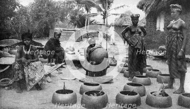 Fanti women making earthenware, Elmina, Ghana, 1922.Artist: PA McCann