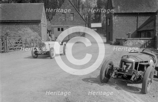 Singer of JR Baker and Riley Brooklands of CA Richardson, Donington Park, Leicestershire, 1933. Artist: Bill Brunell.
