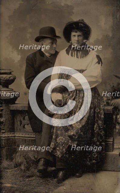 Two Men, One Dressed in Women's Attire, Holding Hands, 1870s-80s. Creator: Unknown.
