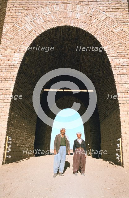 Two workmen outside the Mashki Gate, Nineveh, Iraq, 1977.