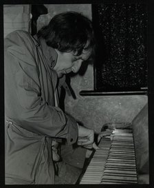 Stan Tracey playing the piano at The Bell, Codicote, Hertfordshire, 2 February 1986. Artist: Denis Williams