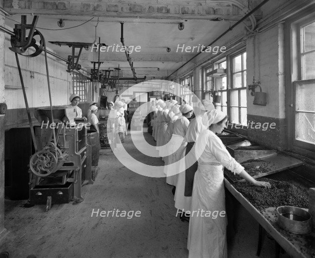 Food production, J Lyons & Co Ltd, Cadby Hall food factory, Hammersmith Road, London, October 1918. Artist: Adolph Augustus Boucher.