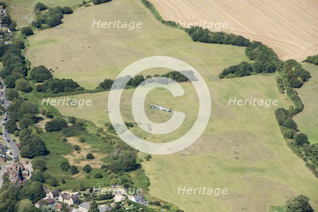 A two seat Spitfire in flight near Goodwood Aerodrome, West Sussex, 2020. Creator: Damian Grady.