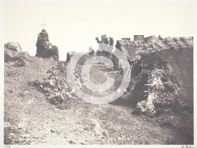 Chaumieres en Auvergne, avec un calvaire, 1852, printed 1978. Creator: Edouard Baldus.