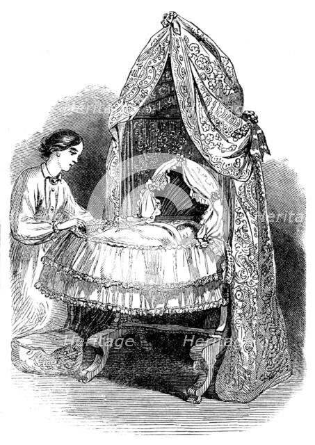 The International Exhibition: new swing-cradle by Norman, 1862. Creator: Unknown.