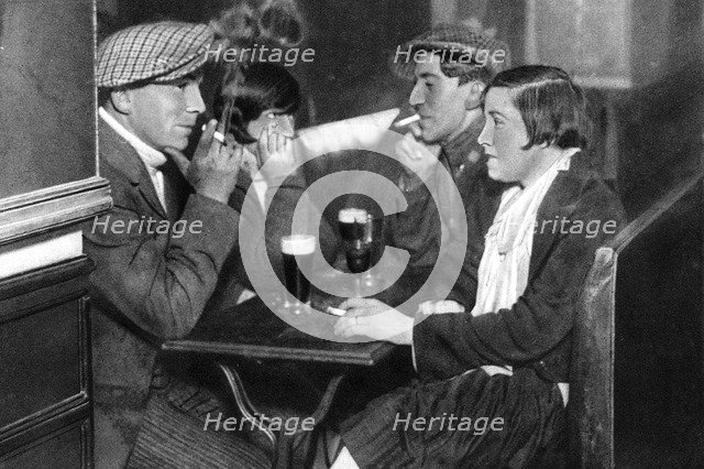 A foursome in a bal-musette, Paris, 1931. Artist: Ernest Flammarion