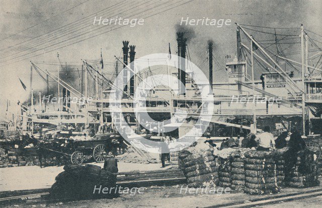 'When Cotton Was Loaded, a forest of derricks and smoke-stacks', 1937. Artist: Unknown.