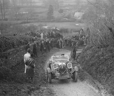 Lagonda of WM Couper performing a braking test, MCC Exeter Trial, Ibberton Hill, Dorset, 1930. Artist: Bill Brunell.