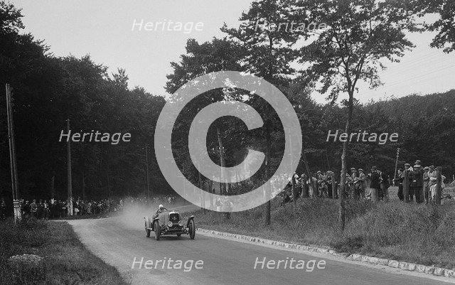 Unidentified car near La Capelle, Boulogne Motor Week, France, 1928. Artist: Bill Brunell.