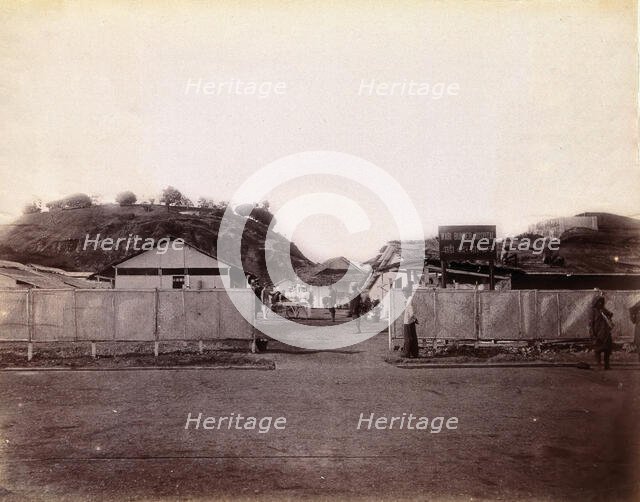 A plague patient being transported on a manually propelled ambulance carriage...,  1896/1897. Creator: Unknown.