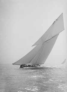 The gaff rigged cutter 'Bloodhound' sailing close-hauled, 1911. Creator: Kirk & Sons of Cowes.