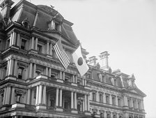 Flags - Japanese And United States Flags On State, War, And Navy Building; Japanese Mission, 1917. Creator: Harris & Ewing.