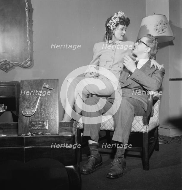 Portrait of Melvin G. Powell and Martha Scott in their home, Connecticut, ca. May 1947. Creator: William Paul Gottlieb.