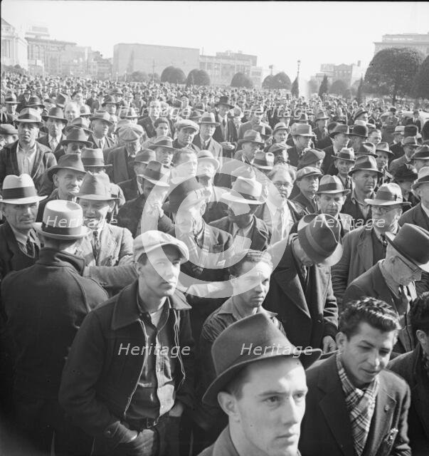 Listening to speeches at mass meeting of WPA workers protesting..., San Francisco, California, 1939. Creator: Dorothea Lange.