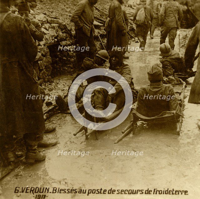 Injured soldiers at the first-aid post, Froideterre, Verdun, northern France, 1917. Artist: Unknown.