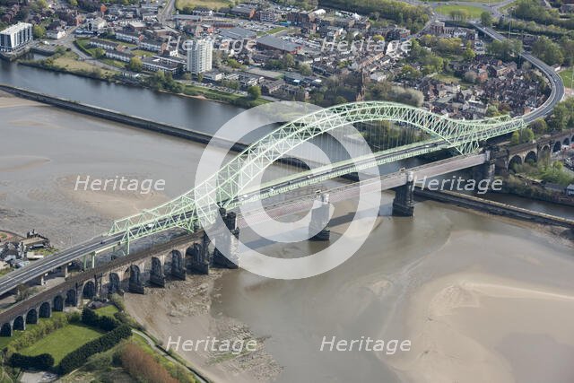 Road and rail bridges over the River Mersey and Manchester Ship Canal at Runcorn Gap, Halton, 2021. Creator: Damian Grady.