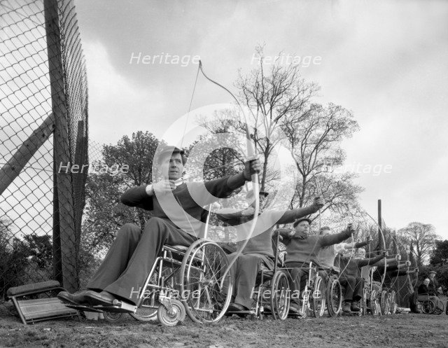 Archery practice at the CISWO paraplegic centre, Pontefract, West Yorkshire, 1960. Artist: Michael Walters