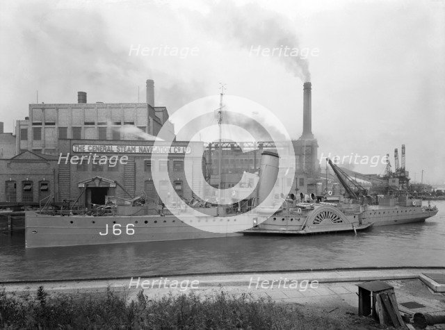 Paddle steamer under arms, Deptford Creek, London, 1940. Creator: Larkin Bros.