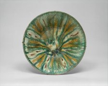 Bowl with Green, Yellow, and Brown Splashed Decoration, Iran, 10th century. Creator: Unknown.