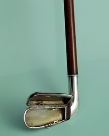 Silver cigarette case walking stick designed to look like a golf club, c1910. Artist: Unknown