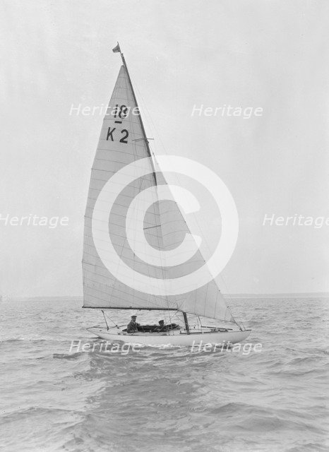 The 18-foot keelboat 'Prudence' (K2) under sail, 1922. Creator: Kirk & Sons of Cowes.