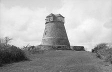 East Knoyle Tower Mill, Windmill Hill, East Knoyle, Wiltshire, 1935.  Creator: HES Simmons.