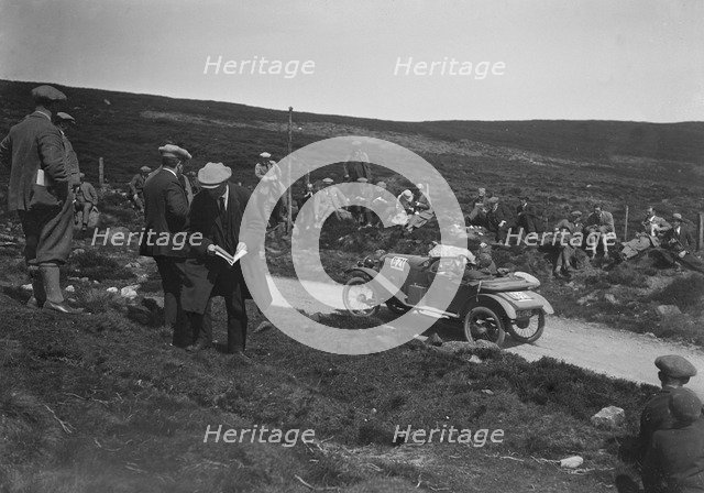 Amilcar open 2-seater of AE Bull competing in the Scottish Light Car Trial, 1922. Artist: Bill Brunell.