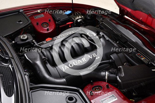 1999 Jaguar XK8 coupe Artist: Unknown.