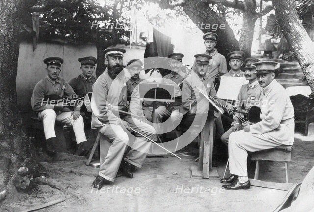 Members of a German Bando POW camp orchestra at Tokushima Prefecture, c. 1917. Creator: Anonymous.