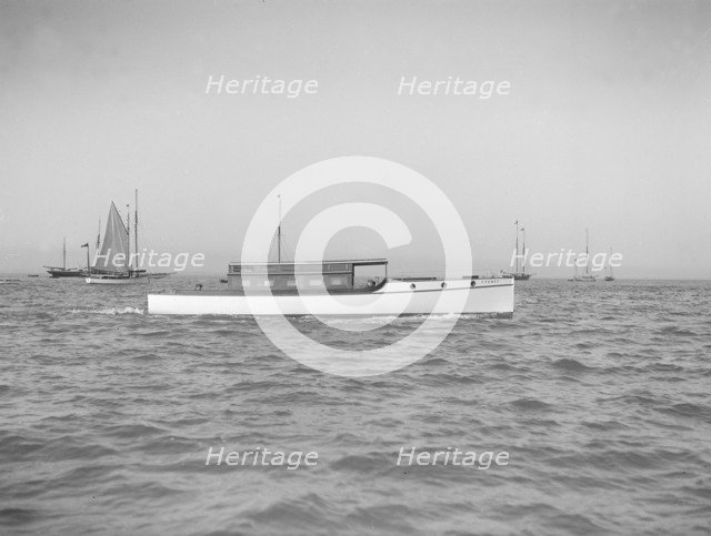 The motor launch 'Cygnet' under way, 1912. Creator: Kirk & Sons of Cowes.