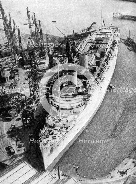 The ocean liner RMS 'Queen Mary', Clydebank, Glasgow, 1934 (1935).Artist: John Brown & Company