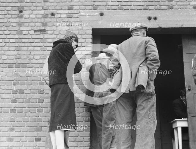 Destitute farm labor families come to FSA distributing depot..., Kern County, California, 1938. Creator: Dorothea Lange.