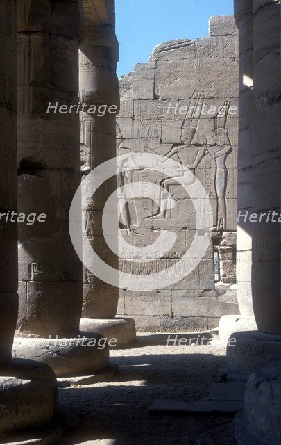 View through to relief of Rameses II before Amun & Mut, Temple of Rameses II, Luxor, Egypt. Artist: Unknown