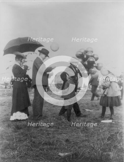 Minnesota State Fair: balloon vendor, 1900?. Creator: Unknown.