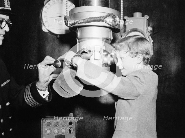 Crown Prince Carl Gustaf of Sweden on a submarine at an exhibition, Stockholm, Sweden, 1956. Artist: Unknown