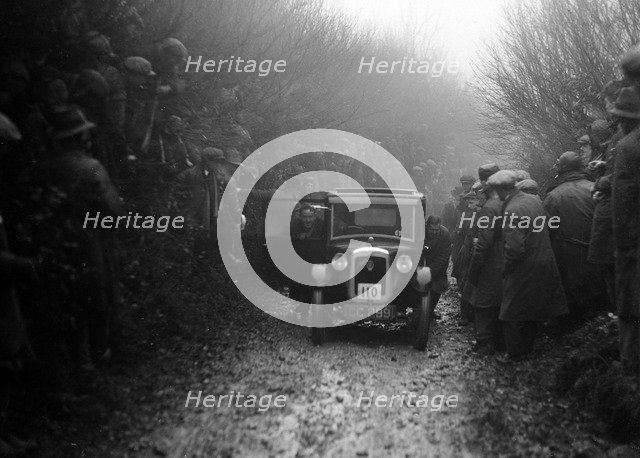 Austin top hat saloon of EC Smyth competing in the MCC Exeter Trial, Meerhay, Dorset, 1930. Artist: Bill Brunell.