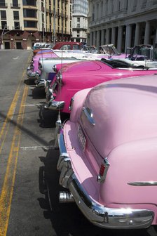 Selection of beautifully restored old American cars alongside the Parque Central, Havana, Cuba, 2024 Creator: Ethel Davies.