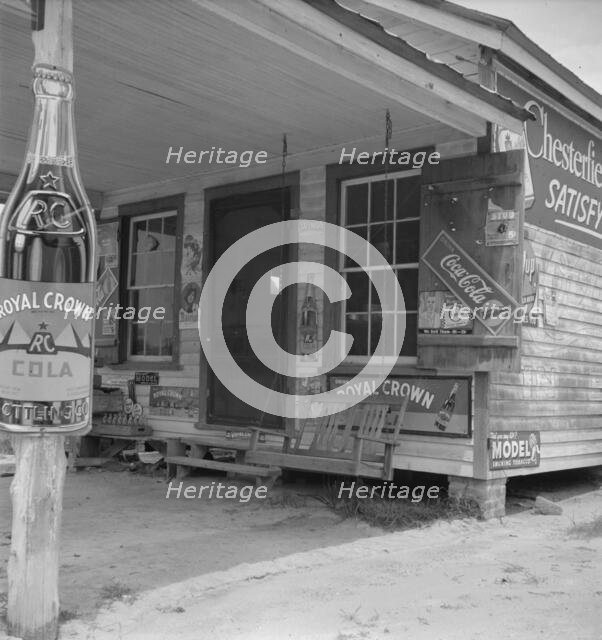Country filling station...by tobacco farmer..., Granville County, North Carolina, 1939. Creator: Dorothea Lange.