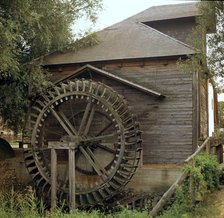 Waterwheel for a mill in Hungary. Artist: CM Dixon Artist: Unknown
