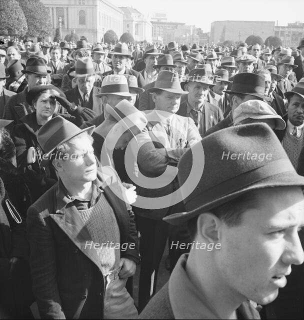 Listening to speeches at mass meeting of WPA workers protesting..., San Francisco, California, 1939. Creator: Dorothea Lange.