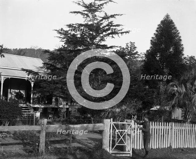 Frederick George Walker at unknown house possibly his home, c1900s. Creator: Robert Augustus Henry L'Estrange.