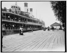 Tashmoo at the dock, Star Isl'd. i.e. Island House, St. Clair Flats, between 1890 and 1901. Creator: Unknown.