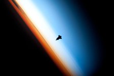 Space Shuttle Endeavour over Earth, c2010.  Creator: NASA.